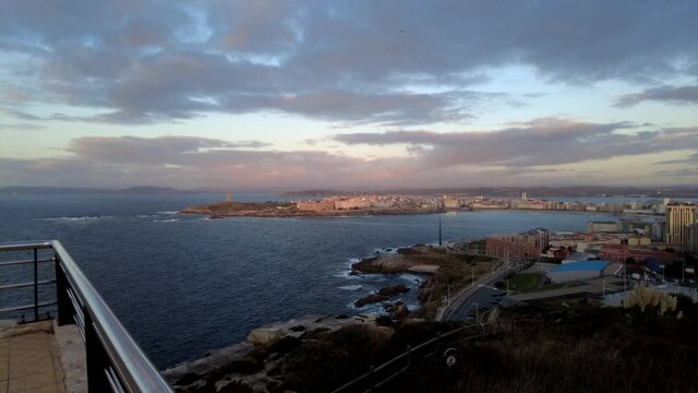 timelapse of the clouds passing at sunset over the Riazor cove