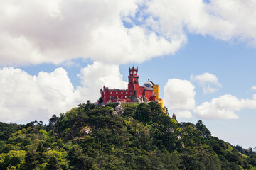 Obraz premium ancient stone castle under blue sky