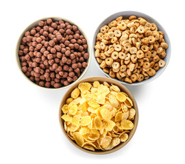 Bowls with cereals on white background