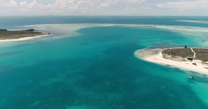 aerial view stationary fly pan rigth along the beach dos mosquices los roques.