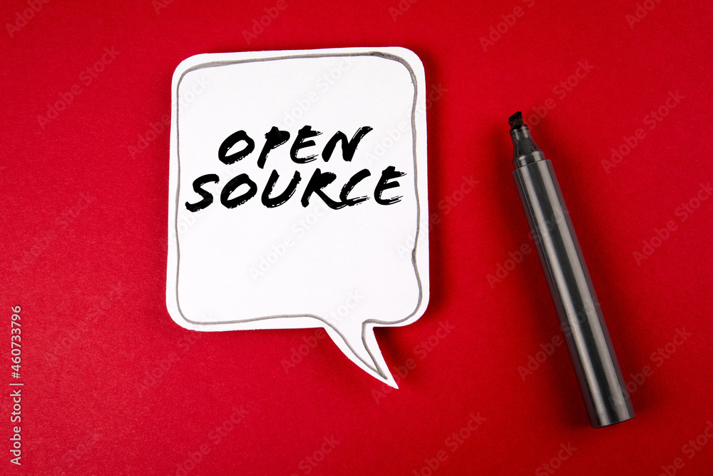 Wall mural open source. speech bubble and black marker on red background