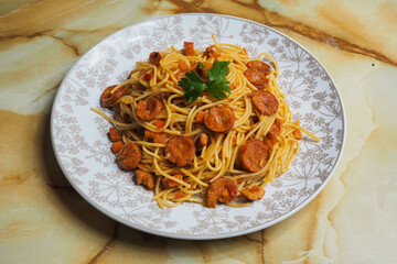 Amazonian Spaghetti, with jerky and chorizo. Peruvian Amazon cuisine.