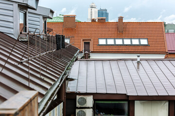 old town rooftops. cityscape of residential area on a rainy day.