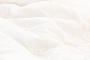 White crumpled blanket background texture, soft fabric texture background wallpaper.