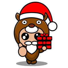 cartoon vector illustration of cute deer animal mascot costume character wearing a christmas hat and holding a gift