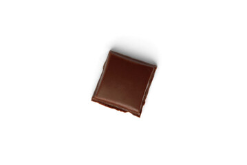 Milk chocolate pieces isolated on white background.