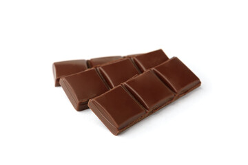 Milk chocolate pieces isolated on white background.