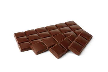 Milk chocolate pieces isolated on white background.