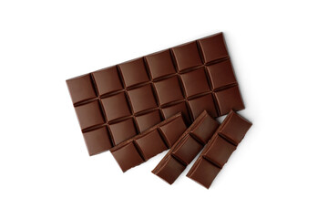 Milk chocolate pieces isolated on white background.
