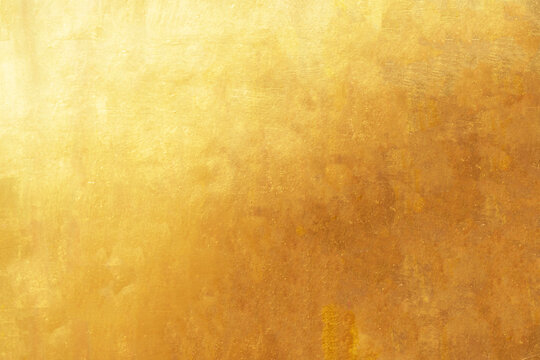 Old glod metal wall background or texture and shadow