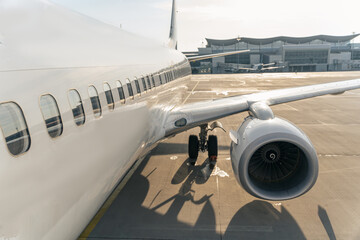 Airplane being preparing ready for takeoff in airport during sunny day