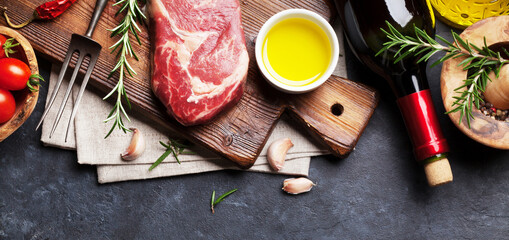 Raw beef steak cooking