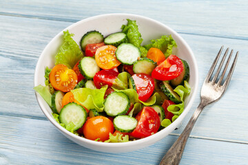 Fresh salad with tomato and cucumber