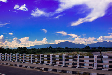 Fototapeta premium clouds over the sky with high north east mountains.