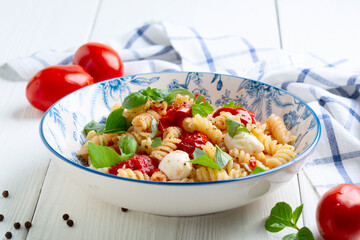Pasta in caprese style.