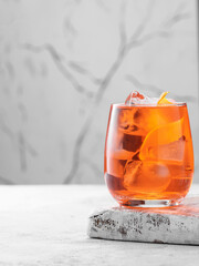 Negroni cocktail on a light background. Copy space.