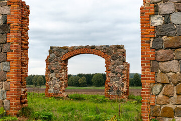 The stone and brick ruins are an unofficial tourist attraction reminiscent of the famous Stonehenge in Britain. It is located in an open field on the outskirts of Smiltene, Latvia