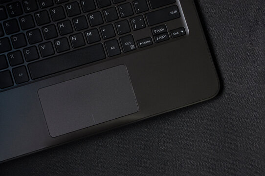 laptop on dark background