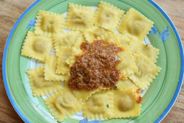 ravioli with tomato sauce top view