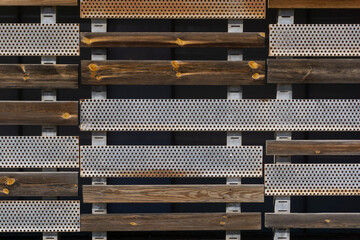 Wood and steel textured wall with holes