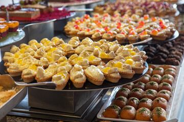 Sweet cakes on the shelf