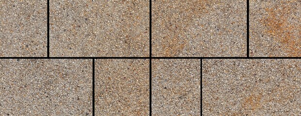 Panorama of brown granite tiled wall with vintage pattern texture and background seamless
