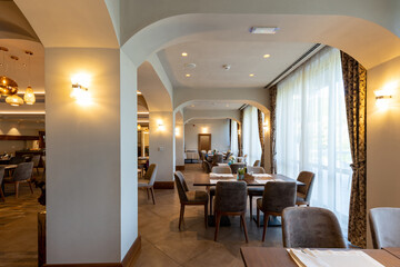 Interior of an empty modern hotel restaurant
