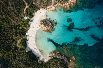 View from above, stunning aerial view of a green coast with the beautiful Prince Beach (Spiaggia...