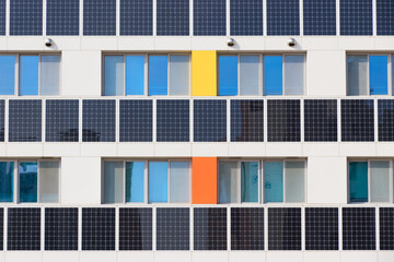 Building solar panels. Solar elementary school building. Eco-friendly school building. Solar panel...