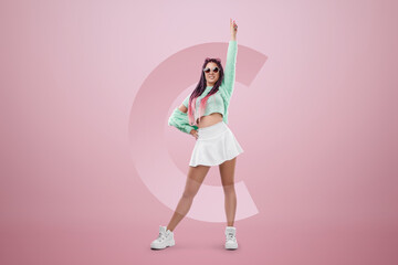 Millennial girl with pink braids hairstyle in turquoise clothes and sunglasses posing on a pink background. Concept for modern style, inclusiveness, individuality, generation Z, copy space.