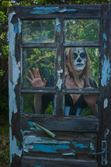 Gothic girl & thistle.
Person in a carnival mask. Mexican death mask
