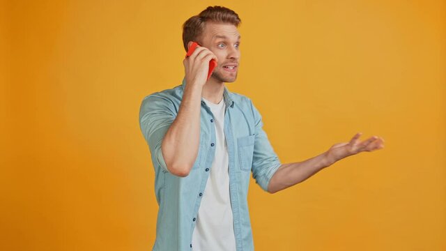 Crazy outraged troubled guy hold telephone talk displeased client concept