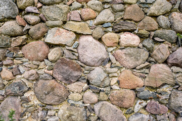 surface of old wall of huge stones of a destroyed ancient building