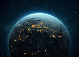 Amazing blue planet Earth with night yellow lights of megacities in space with stars. Deep space...