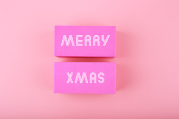 Trendy pink Merry Xmas minimal concept in light colors