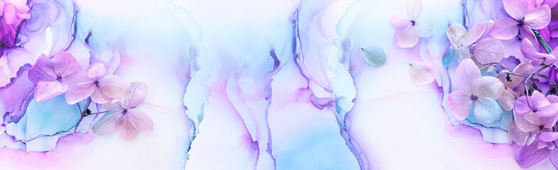 Creative image of pastel blue and purple Hydrangea flowers on artistic ink background. Top view...