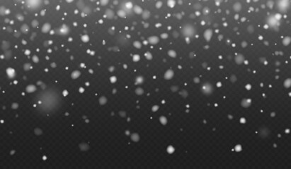 Falling snow in motion, white blurred snowflakes flying in the air.