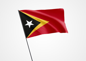 Timor Leste flag flying high in the white isolated background. May 20 Timor Leste independence day World national flag collection world national flag collection