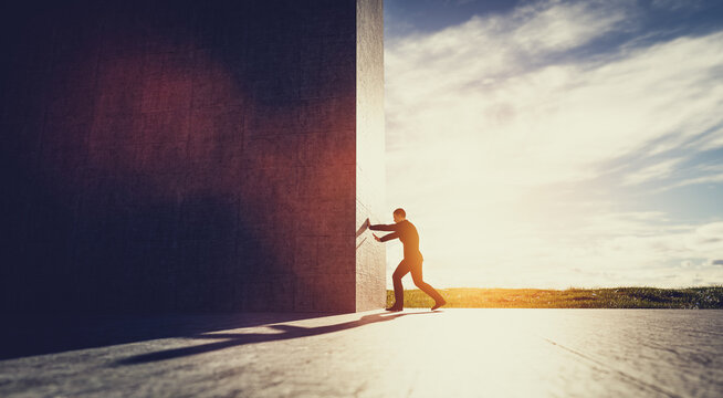 Man pushing big wall to reveal new better green world