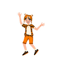 Boy in carnival costume and tiger hat. Festive clothing for theatre, new year, Christmas and holiday. Child is dancing with joyful face and happy emotions
