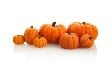 Heap of many pumpkins isolated on white background, Autumn and Halloween concept