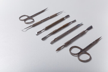 Manicure, pedicure equipment set on white background. Disinfected instruments for safe hygiene, beauty and hands care. Copy space