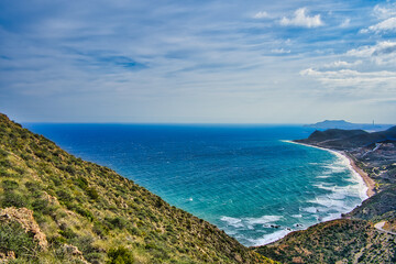 view of the sea and the beach from the top of the mountain in Spain, near Cabo de Gate