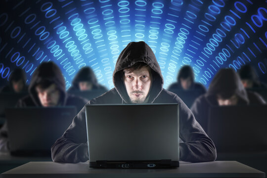 Many hackers in troll farm. Security and cyber crime concept.