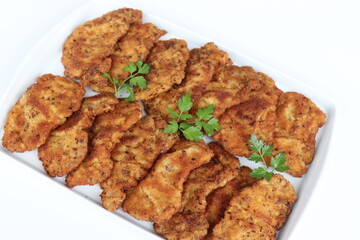 Schnitzel aus Sweinelende in Leinsamenpanat.