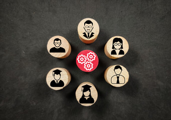 Wooden block cylinder, an icon of students and teachers with the concept of a school Management system.