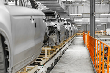 car conveyor at a modern factory, body before painting