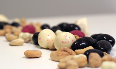 Christmas berry and nut chocolates and salted cashew nuts. Delicious gourmet snacks.