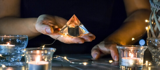 Tarot cards, Fortune telling on tarot cards at night by candlelight, magic crystal, occultism, Esoteric background. Fortune telling, tarot predictions.