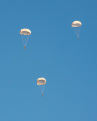 Skydiver activity sport jump on the blue sky background